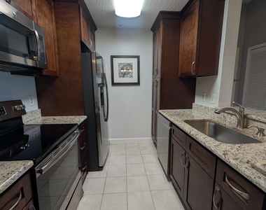 7667 N Wickham Road - Photo Thumbnail 7