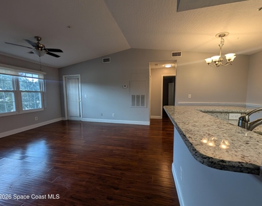 7667 N Wickham Road - Photo Thumbnail 2