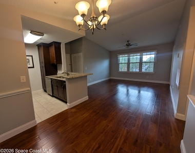 7667 N Wickham Road - Photo Thumbnail 5