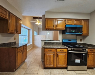 5619 Fairview Forest Drive - Photo Thumbnail 7