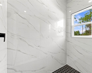 143 W Gondolier Place - Photo Thumbnail 40