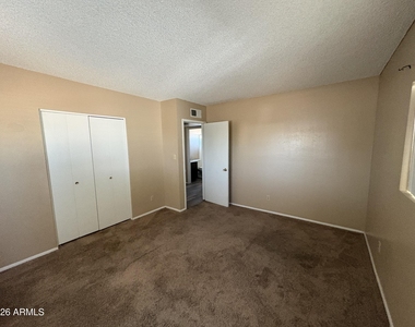11214 W Nevada Avenue - Photo Thumbnail 6