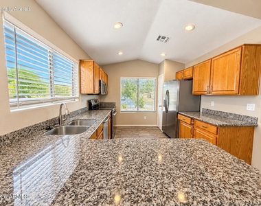 10341 E Calypso Avenue - Photo Thumbnail 8