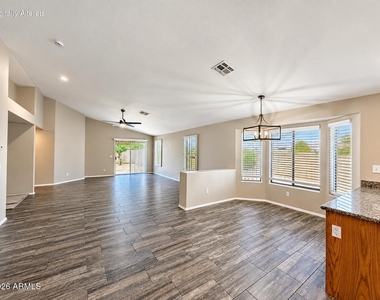 10341 E Calypso Avenue - Photo Thumbnail 6