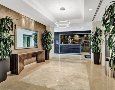 99 Se Mizner Boulevard - Photo Thumbnail 5