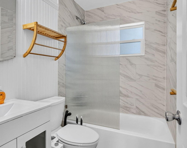 216 E 24th Street - Photo Thumbnail 28