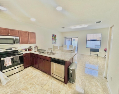10490 W 33rd Way - Photo Thumbnail 1