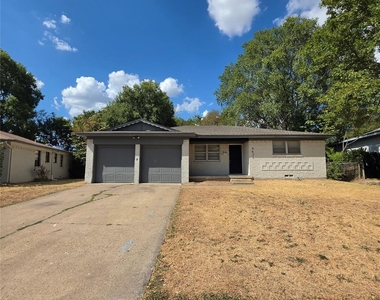 9421 Bluffcreek Drive - Photo Thumbnail 1