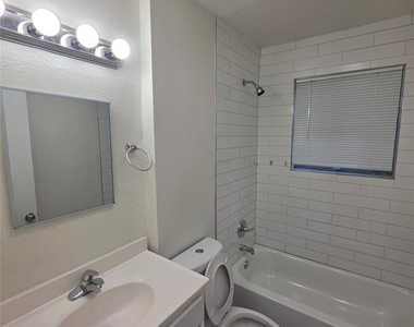 9421 Bluffcreek Drive - Photo Thumbnail 6