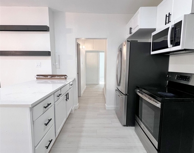 1542 E Ohio Avenue - Photo Thumbnail 8