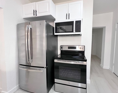 1542 E Ohio Avenue - Photo Thumbnail 7