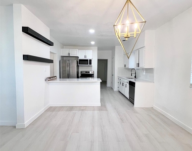 1542 E Ohio Avenue - Photo Thumbnail 3