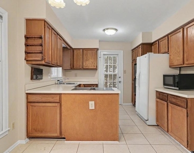 11402 Flints Grove Lane - Photo Thumbnail 3