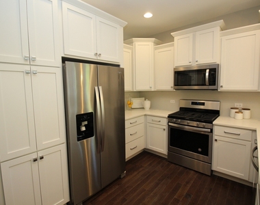 10744 W Clocktower Drive - Photo Thumbnail 6
