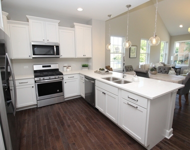 10744 W Clocktower Drive - Photo Thumbnail 4