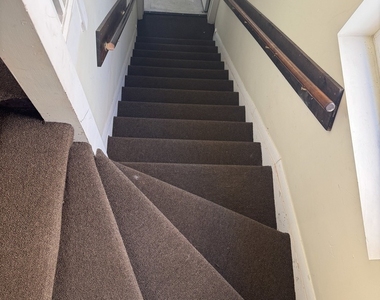 8129 S Evans Avenue - Photo Thumbnail 1