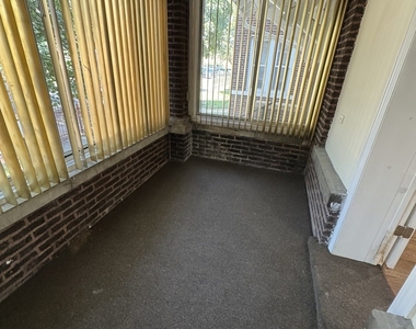 8129 S Evans Avenue - Photo Thumbnail 4