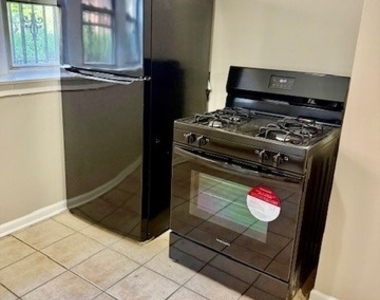 7932 S Kingston Avenue - Photo Thumbnail 1