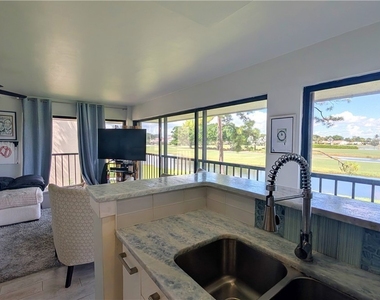 7410 Lake Breeze Drive - Photo Thumbnail 11