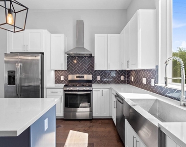 1114 W 15th 1/2 Street - Photo Thumbnail 23