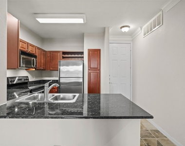 7575 Kirby Drive - Photo Thumbnail 1