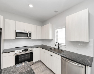 7711 Longmire Road - Photo Thumbnail 11