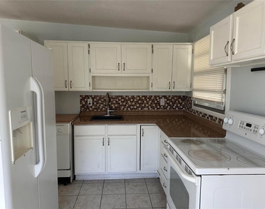 9571 83rd Street - Photo Thumbnail 2