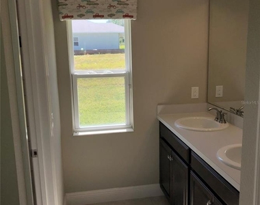 5512 Windsong Oak Drive - Photo Thumbnail 18