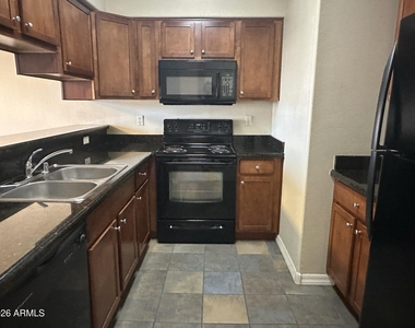1117 E 8th Street - Photo Thumbnail 4