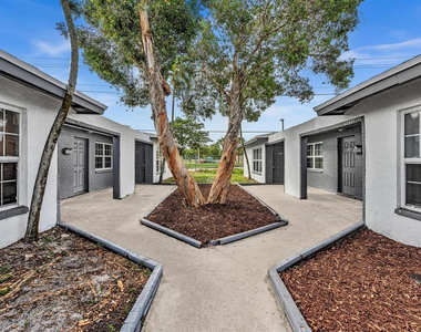 5744 Nw 27th Court - Photo Thumbnail 1