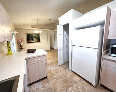 6707 Coquina Avenue - Photo Thumbnail 11