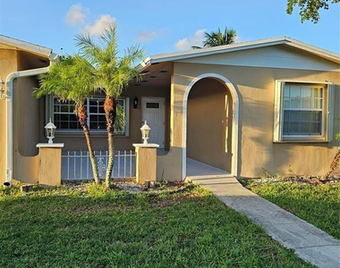9431 Nw 24th Place - Photo Thumbnail 2