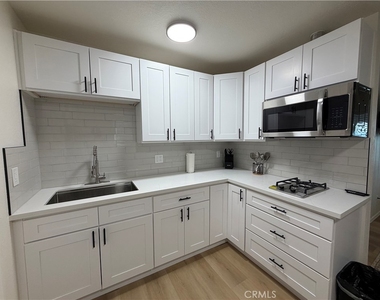 208 W Rice St - Photo Thumbnail 2