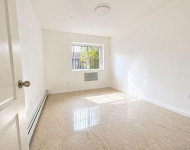 90-17 56 Avenue - Photo Thumbnail 3