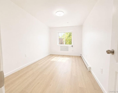 90-17 56 Avenue - Photo Thumbnail 2