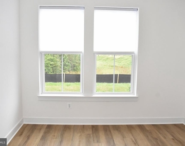 9604 Blue Ash Alley - Photo Thumbnail 2