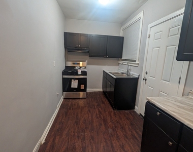 1020 W 68th Street - Photo Thumbnail 6