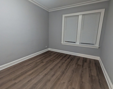 1020 W 68th Street - Photo Thumbnail 2