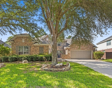 10702 Winding Green Drive - Photo Thumbnail 1