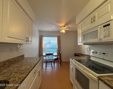 1225 N Wickham Road - Photo Thumbnail 6