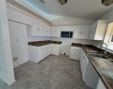 1160 W Geneva Place - Photo Thumbnail 8