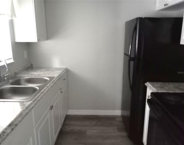 1229 Kennedy Road - Photo Thumbnail 2