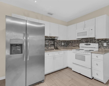 613 E 2nd Street - Photo Thumbnail 4
