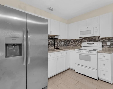 613 E 2nd Street - Photo Thumbnail 17