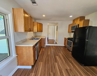 56 E Church St - Photo Thumbnail 7
