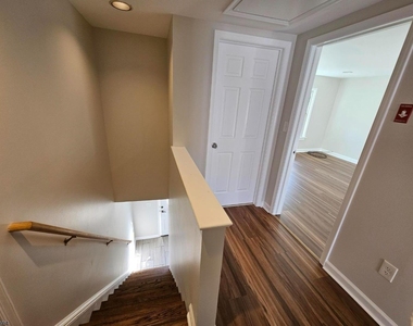 56 E Church St - Photo Thumbnail 4