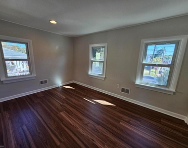 56 E Church St - Photo Thumbnail 15