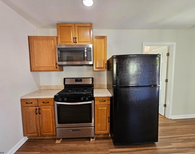 56 E Church St - Photo Thumbnail 8