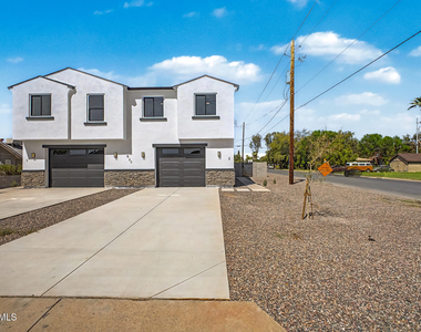 920 E Pasadena Avenue - Photo Thumbnail 3