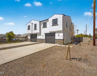 920 E Pasadena Avenue - Photo Thumbnail 1